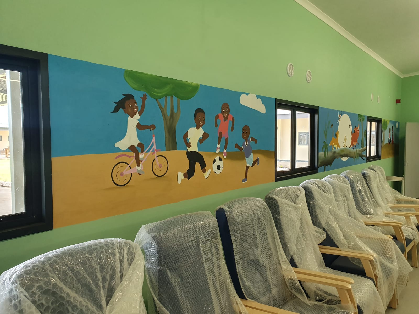 Local Artist Paints Mural at Mambwe District Hospital